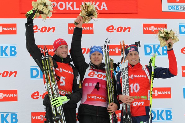 Left to right: Jakov Fak of Slovenia, Andreas Birnbacher of Germany, Tim Burke of the United States on the podium // photo US Biathlon/Nordic Focus